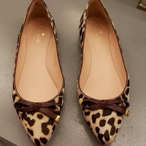 Kate Spade Emma flats with animal print and bow.